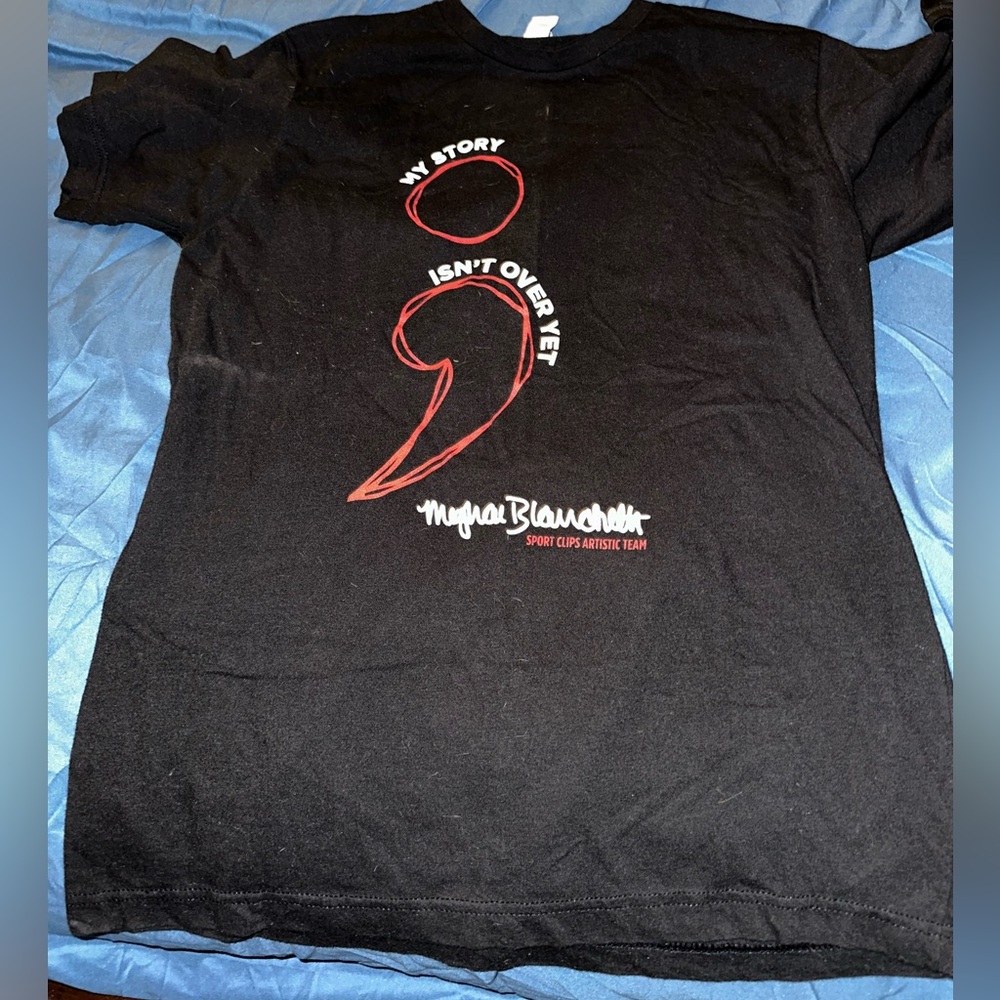 Sport Clips tee (uniform)